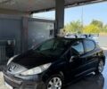 Черный Пежо 207, объемом двигателя 1.36 л и пробегом 144 тыс. км за 5700 $, фото 1 на Automoto.ua
