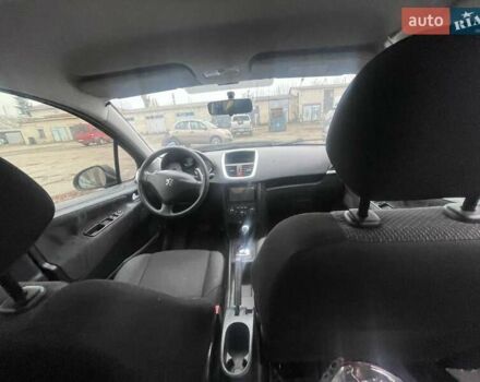 Чорний Пежо 207, об'ємом двигуна 1.36 л та пробігом 130 тис. км за 1699 $, фото 6 на Automoto.ua