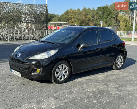 Черный Пежо 207, объемом двигателя 1.36 л и пробегом 233 тыс. км за 4400 $, фото 1 на Automoto.ua