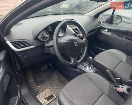 Чорний Пежо 207, об'ємом двигуна 1.36 л та пробігом 130 тис. км за 1699 $, фото 3 на Automoto.ua