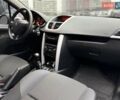 Черный Пежо 207, объемом двигателя 1.56 л и пробегом 280 тыс. км за 3950 $, фото 11 на Automoto.ua