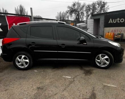 Чорний Пежо 207, об'ємом двигуна 1.4 л та пробігом 180 тис. км за 4990 $, фото 5 на Automoto.ua