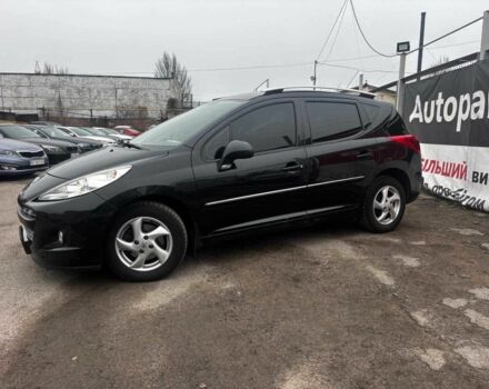 Чорний Пежо 207, об'ємом двигуна 1.4 л та пробігом 180 тис. км за 4990 $, фото 1 на Automoto.ua