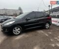 Черный Пежо 207, объемом двигателя 1.4 л и пробегом 180 тыс. км за 4990 $, фото 1 на Automoto.ua