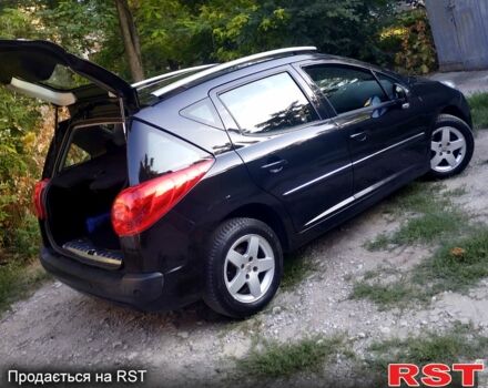 Черный Пежо 207, объемом двигателя 1.4 л и пробегом 225 тыс. км за 5500 $, фото 4 на Automoto.ua