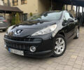 Черный Пежо 207, объемом двигателя 1.6 л и пробегом 200 тыс. км за 5500 $, фото 1 на Automoto.ua