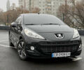 Черный Пежо 207, объемом двигателя 1.6 л и пробегом 137 тыс. км за 6500 $, фото 1 на Automoto.ua