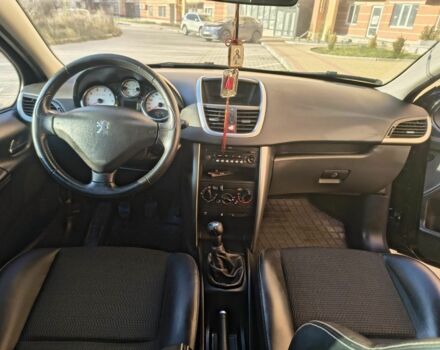 Черный Пежо 207, объемом двигателя 1.6 л и пробегом 220 тыс. км за 4000 $, фото 1 на Automoto.ua