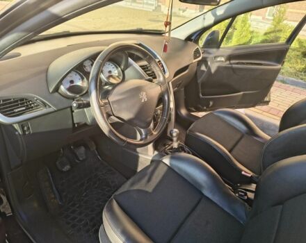 Черный Пежо 207, объемом двигателя 1.6 л и пробегом 220 тыс. км за 4000 $, фото 6 на Automoto.ua