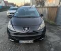 Черный Пежо 207, объемом двигателя 1.6 л и пробегом 211 тыс. км за 2900 $, фото 1 на Automoto.ua