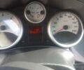 Черный Пежо 207, объемом двигателя 1.6 л и пробегом 210 тыс. км за 4200 $, фото 1 на Automoto.ua