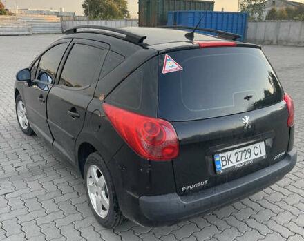Черный Пежо 207, объемом двигателя 1.36 л и пробегом 243 тыс. км за 3200 $, фото 2 на Automoto.ua