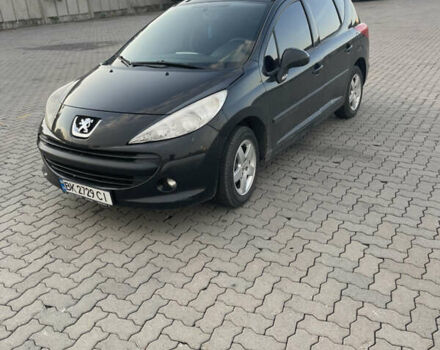 Черный Пежо 207, объемом двигателя 1.36 л и пробегом 243 тыс. км за 3200 $, фото 1 на Automoto.ua