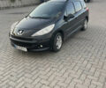 Черный Пежо 207, объемом двигателя 1.36 л и пробегом 243 тыс. км за 3200 $, фото 1 на Automoto.ua
