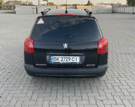 Черный Пежо 207, объемом двигателя 1.36 л и пробегом 243 тыс. км за 3200 $, фото 3 на Automoto.ua