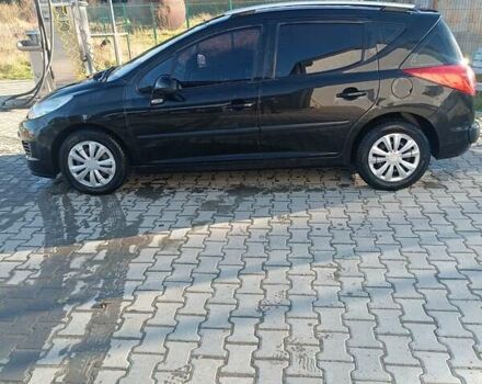 Черный Пежо 207, объемом двигателя 1.4 л и пробегом 285 тыс. км за 3500 $, фото 1 на Automoto.ua