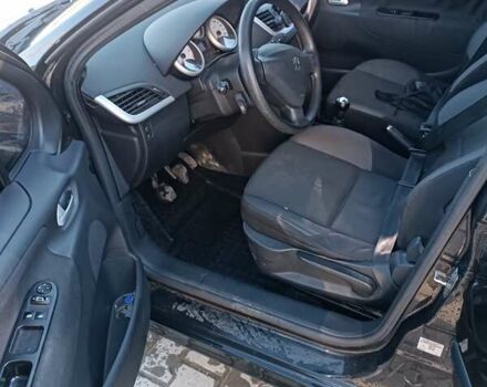 Черный Пежо 207, объемом двигателя 1.4 л и пробегом 285 тыс. км за 3500 $, фото 3 на Automoto.ua