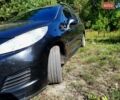 Черный Пежо 207, объемом двигателя 1.56 л и пробегом 215 тыс. км за 5000 $, фото 3 на Automoto.ua
