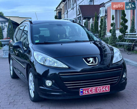 Черный Пежо 207, объемом двигателя 1.6 л и пробегом 171 тыс. км за 4950 $, фото 1 на Automoto.ua