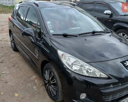 Черный Пежо 207, объемом двигателя 1.56 л и пробегом 255 тыс. км за 5000 $, фото 4 на Automoto.ua