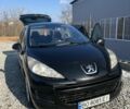 Черный Пежо 207, объемом двигателя 1.6 л и пробегом 270 тыс. км за 5600 $, фото 1 на Automoto.ua