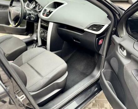 Черный Пежо 207, объемом двигателя 1.4 л и пробегом 125 тыс. км за 5300 $, фото 11 на Automoto.ua