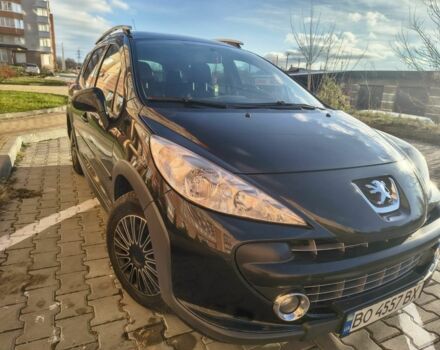 Черный Пежо 207, объемом двигателя 1.6 л и пробегом 220 тыс. км за 4000 $, фото 1 на Automoto.ua