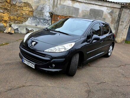 Черный Пежо 207, объемом двигателя 1.4 л и пробегом 144 тыс. км за 4000 $, фото 1 на Automoto.ua