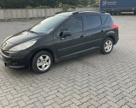 Черный Пежо 207, объемом двигателя 1.36 л и пробегом 243 тыс. км за 3200 $, фото 1 на Automoto.ua