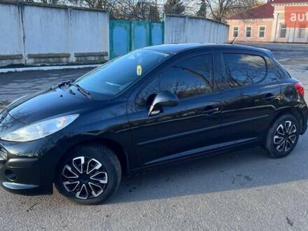 Черный Пежо 207, объемом двигателя 1.36 л и пробегом 145 тыс. км за 4900 $, фото 1 на Automoto.ua