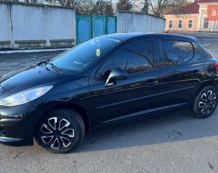 Черный Пежо 207, объемом двигателя 1.36 л и пробегом 145 тыс. км за 4900 $, фото 1 на Automoto.ua