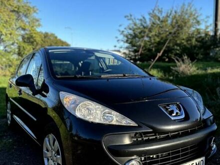 Черный Пежо 207, объемом двигателя 1.6 л и пробегом 260 тыс. км за 4950 $, фото 1 на Automoto.ua