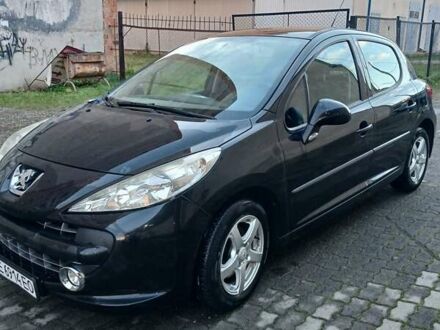 Черный Пежо 207, объемом двигателя 1.6 л и пробегом 220 тыс. км за 5500 $, фото 1 на Automoto.ua