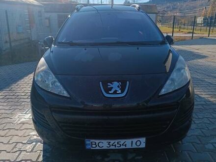 Черный Пежо 207, объемом двигателя 1.4 л и пробегом 285 тыс. км за 3500 $, фото 1 на Automoto.ua