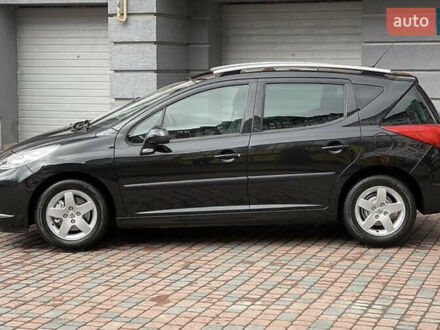 Черный Пежо 207, объемом двигателя 1.4 л и пробегом 160 тыс. км за 4900 $, фото 1 на Automoto.ua