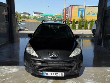 Черный Пежо 207, объемом двигателя 1.36 л и пробегом 144 тыс. км за 5700 $, фото 1 на Automoto.ua