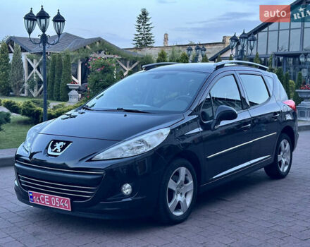 Черный Пежо 207, объемом двигателя 1.6 л и пробегом 170 тыс. км за 4950 $, фото 1 на Automoto.ua