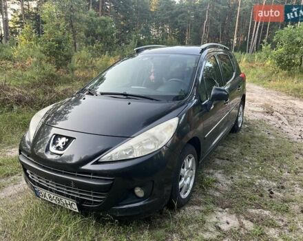 Черный Пежо 207, объемом двигателя 1.56 л и пробегом 325 тыс. км за 4100 $, фото 1 на Automoto.ua