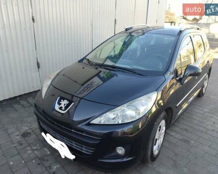 Черный Пежо 207, объемом двигателя 1.6 л и пробегом 307 тыс. км за 5200 $, фото 1 на Automoto.ua