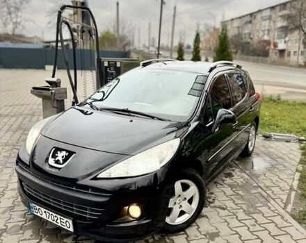 Черный Пежо 207, объемом двигателя 1.4 л и пробегом 125 тыс. км за 5300 $, фото 1 на Automoto.ua