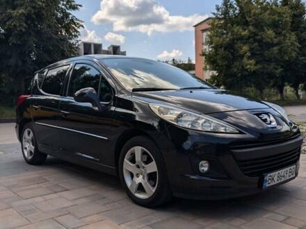 Черный Пежо 207, объемом двигателя 1.56 л и пробегом 227 тыс. км за 6000 $, фото 1 на Automoto.ua