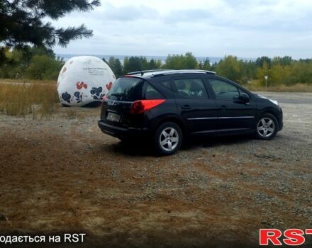 Черный Пежо 207, объемом двигателя 1.4 л и пробегом 225 тыс. км за 5500 $, фото 1 на Automoto.ua