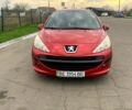 Красный Пежо 207, объемом двигателя 1.4 л и пробегом 141 тыс. км за 4550 $, фото 1 на Automoto.ua