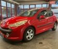 Красный Пежо 207, объемом двигателя 1.4 л и пробегом 188 тыс. км за 5500 $, фото 1 на Automoto.ua