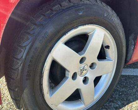 Красный Пежо 207, объемом двигателя 1.4 л и пробегом 169 тыс. км за 3200 $, фото 11 на Automoto.ua