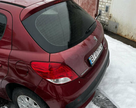 Червоний Пежо 207, об'ємом двигуна 1.4 л та пробігом 260 тис. км за 3800 $, фото 14 на Automoto.ua