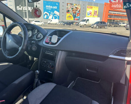 Красный Пежо 207, объемом двигателя 1.4 л и пробегом 169 тыс. км за 3200 $, фото 6 на Automoto.ua