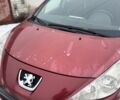 Красный Пежо 207, объемом двигателя 1.4 л и пробегом 260 тыс. км за 3500 $, фото 1 на Automoto.ua