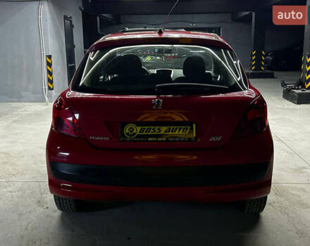 Красный Пежо 207, объемом двигателя 1.36 л и пробегом 169 тыс. км за 4500 $, фото 4 на Automoto.ua