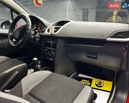 Красный Пежо 207, объемом двигателя 1.36 л и пробегом 169 тыс. км за 4500 $, фото 10 на Automoto.ua